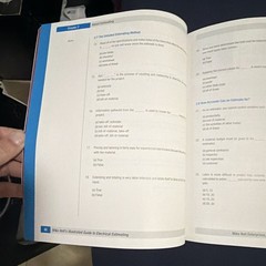 Mike Holt Illustrated Guide to Electrical Estimating 2nd Ed. & answer key book.