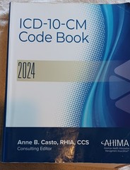 ICD-10-CM Code Book 2024 by Anne Casto (2023, Trade Paperback)